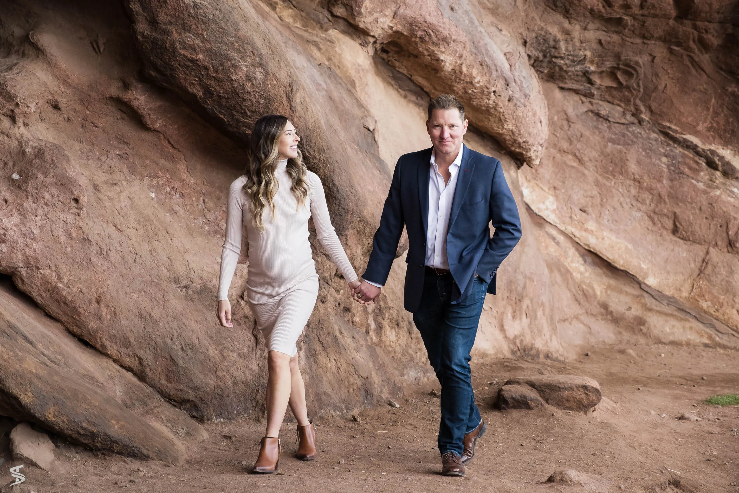 A couple beside red rock formations